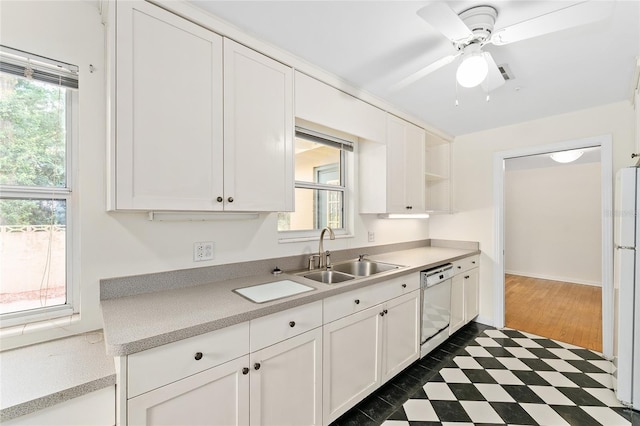 3857 SW 4th Pl, Gainesville, FL 32607 - kitchen with white appliances, white cabinetry, and light countertops