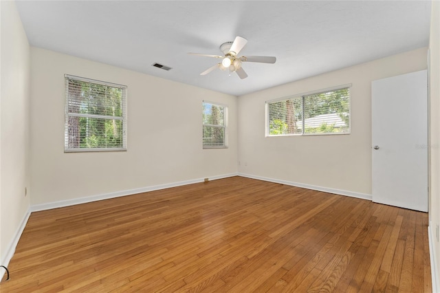 3857 SW 4th Pl, Gainesville, FL 32607 - spare room featuring light wood finished floors and a ceiling fan