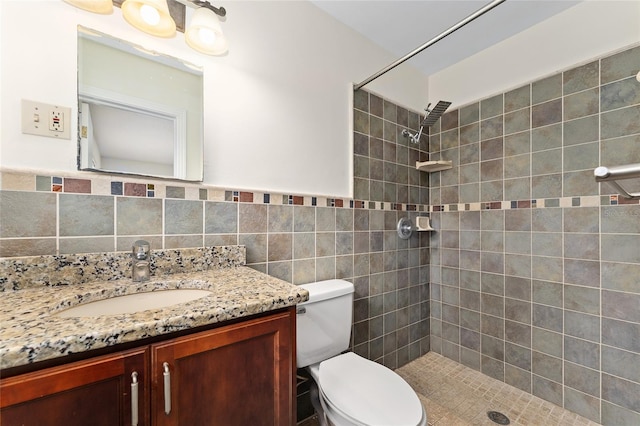 3857 SW 4th Pl, Gainesville, FL 32607 - full bath featuring a tile shower, vanity, and tile walls