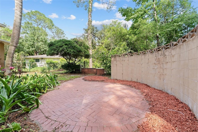3857 SW 4th Pl, Gainesville, FL 32607 - fenced backyard with a patio area