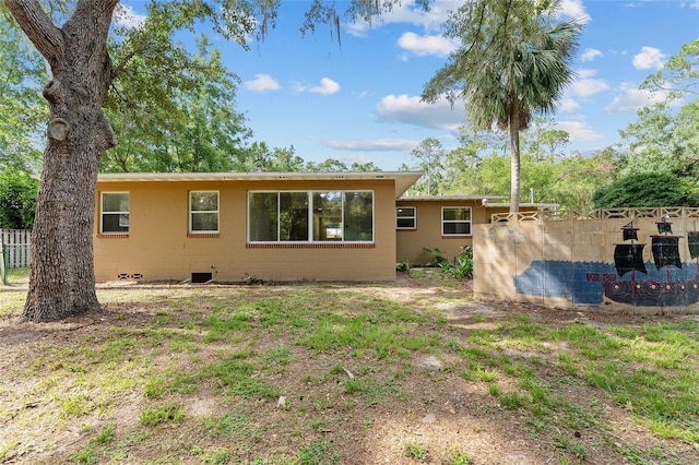 3857 SW 4th Pl, Gainesville, FL 32607 - rear view of property with concrete block siding