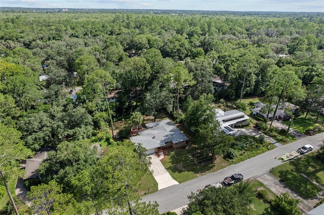 3857 SW 4th Pl, Gainesville, FL 32607 - aerial view of property and surrounding area featuring a heavily wooded area