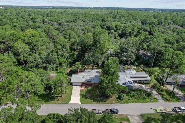 3857 SW 4th Pl, Gainesville, FL 32607 - aerial view of property and surrounding area with a heavily wooded area