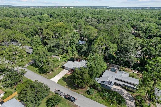 3857 SW 4th Pl, Gainesville, FL 32607 - aerial overview of property's location featuring a heavily wooded area