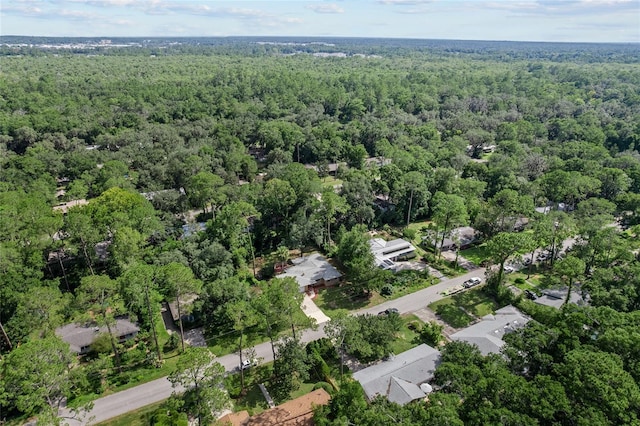 3857 SW 4th Pl, Gainesville, FL 32607 - aerial view of property and surrounding area featuring a heavily wooded area