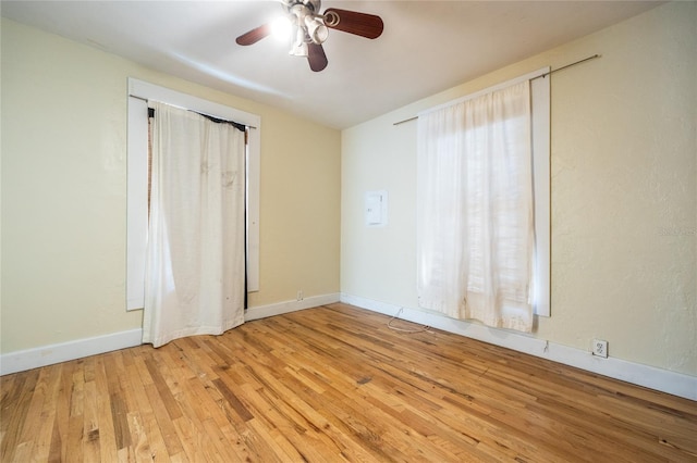 407 NW 8th St, Gainesville, FL 32601 - spare room featuring light wood finished floors and a ceiling fan