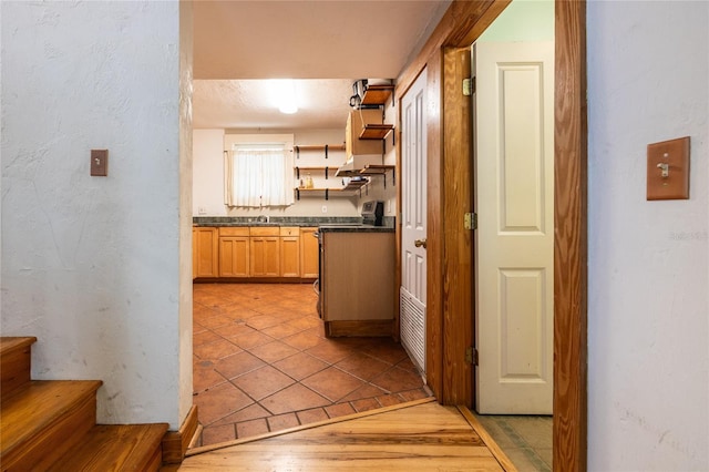 407 NW 8th St, Gainesville, FL 32601 - kitchen with dark countertops and open shelves