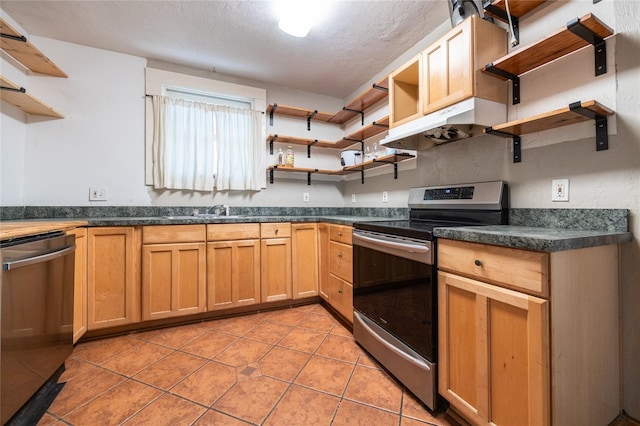 407 NW 8th St, Gainesville, FL 32601 - kitchen featuring open shelves, stainless steel appliances, under cabinet range hood, dark countertops, and light tile patterned floors