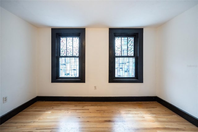 407 NW 8th St, Gainesville, FL 32601 - empty room with wood finished floors