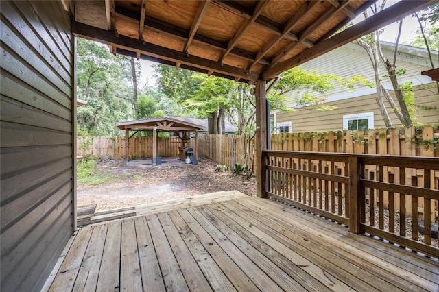 407 NW 8th St, Gainesville, FL 32601 - wooden deck with a fenced backyard and a gazebo