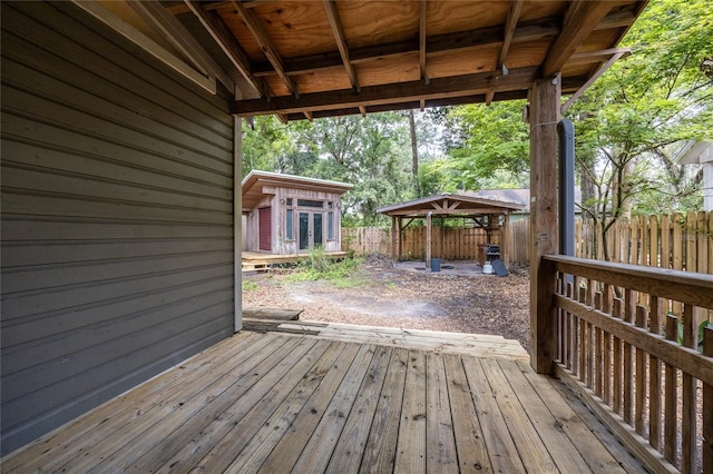 407 NW 8th St, Gainesville, FL 32601 - wooden terrace with an outdoor structure and a gazebo
