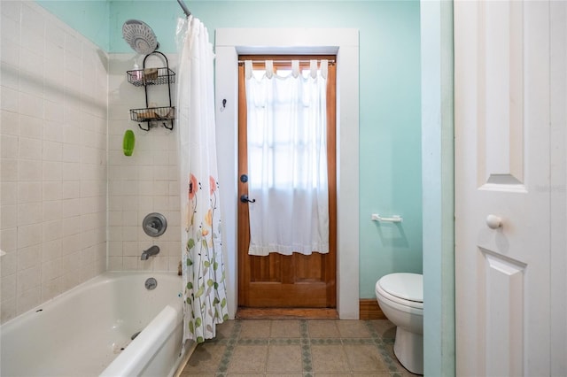 407 NW 8th St, Gainesville, FL 32601 - bathroom featuring toilet and shower / bath combo