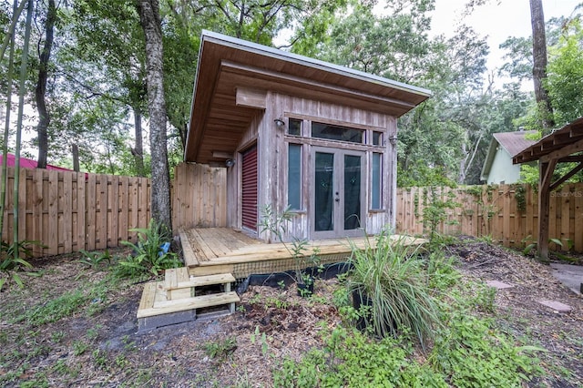 407 NW 8th St, Gainesville, FL 32601 - view of outbuilding featuring a fenced backyard and french doors