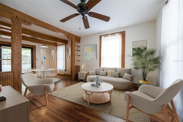 407 NW 8th St, Gainesville, FL 32601 - living area with hardwood / wood-style floors, a ceiling fan, and beam ceiling
