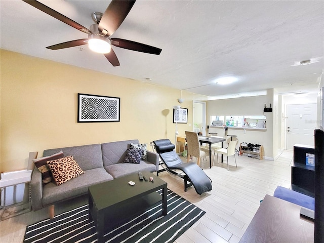 4000 SW 23rd St Unit 2-104, Gainesville, FL 32608 - living room featuring ceiling fan