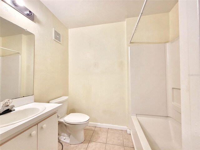 4000 SW 23rd St Unit 2-104, Gainesville, FL 32608 - full bath with tile patterned floors, vanity, and bathtub / shower combination