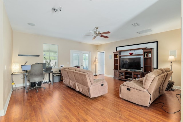 7547 SW 87th Ter, Gainesville, FL 32608 - living room featuring wood finished floors, ceiling fan, and an office area
