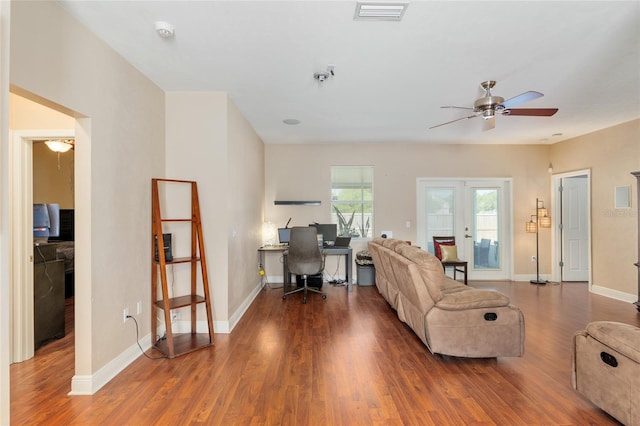 7547 SW 87th Ter, Gainesville, FL 32608 - living room featuring an office area, ceiling fan, wood finished floors, and french doors