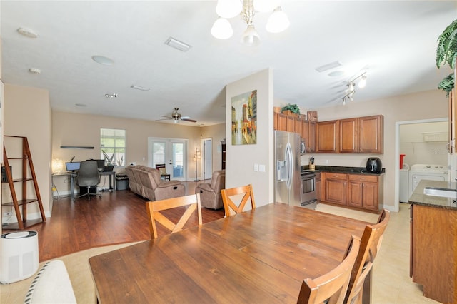 7547 SW 87th Ter, Gainesville, FL 32608 - dining area featuring an office area, a ceiling fan, and a chandelier