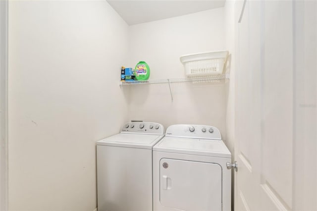 7547 SW 87th Ter, Gainesville, FL 32608 - washroom featuring separate washer and dryer