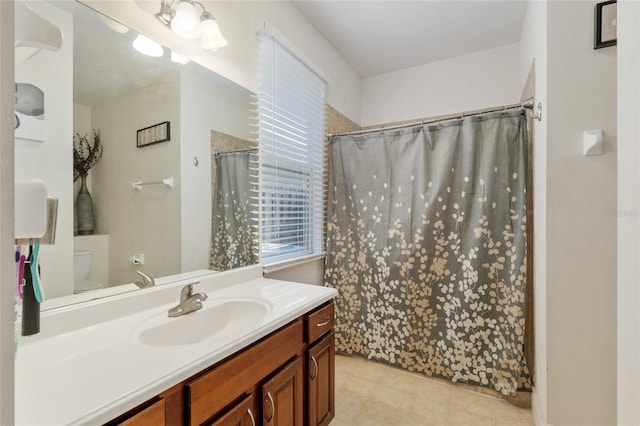 7547 SW 87th Ter, Gainesville, FL 32608 - bathroom featuring healthy amount of natural light, vanity, and a shower with curtain