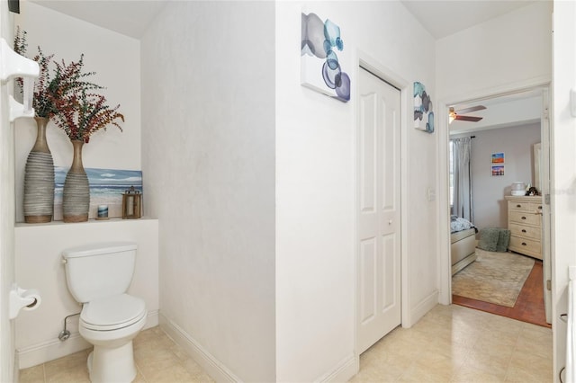 7547 SW 87th Ter, Gainesville, FL 32608 - bathroom with ceiling fan and toilet
