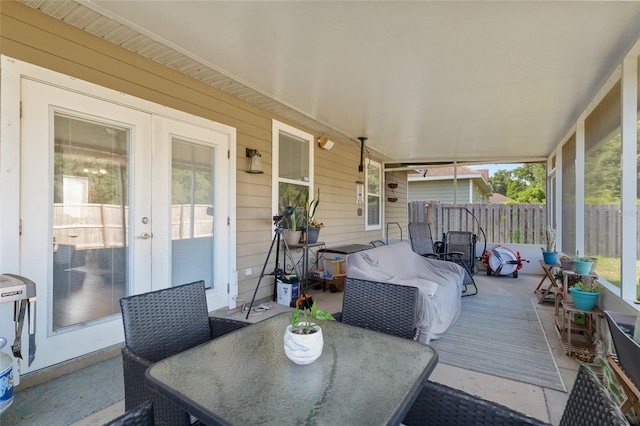 7547 SW 87th Ter, Gainesville, FL 32608 - wooden deck with french doors and outdoor dining area