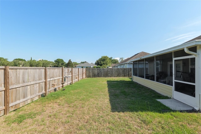 7547 SW 87th Ter, Gainesville, FL 32608 - fenced backyard with a sunroom