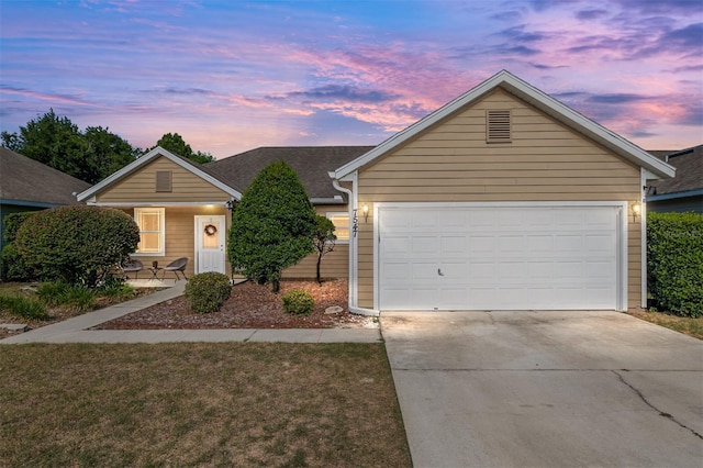 7547 SW 87th Ter, Gainesville, FL 32608 - ranch-style house with concrete driveway and a garage