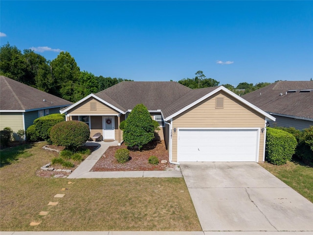 7547 SW 87th Ter, Gainesville, FL 32608 - view of front of property featuring a garage, a front lawn, and concrete driveway
