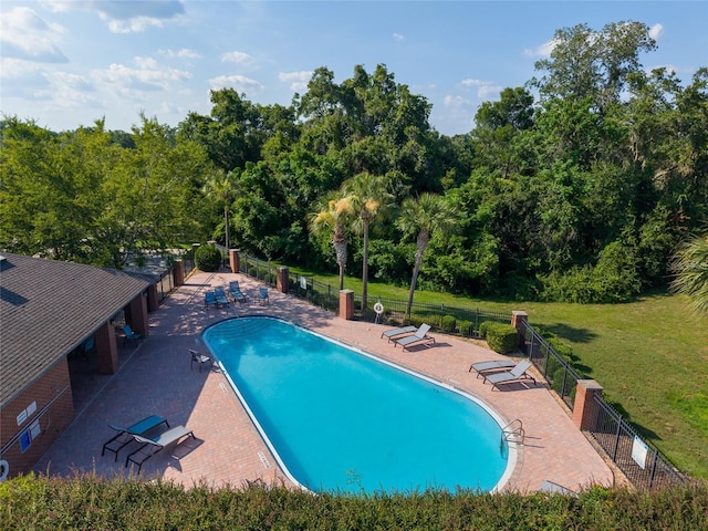 7547 SW 87th Ter, Gainesville, FL 32608 - community pool featuring a patio