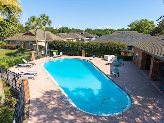 7547 SW 87th Ter, Gainesville, FL 32608 - community pool featuring a patio and a residential view