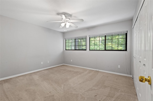 7074 NW 52nd Ter, Gainesville, FL 32653 - carpeted empty room with ceiling fan and baseboards