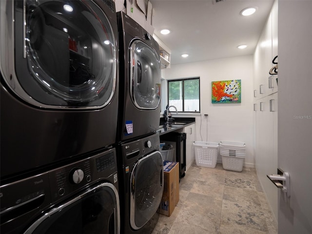 2261 NW 24th Ave, Gainesville, FL 32605 - laundry room featuring stacked washer / drying machine, stone finish floors, separate washer and dryer, and recessed lighting