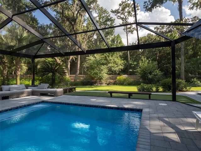 2261 NW 24th Ave, Gainesville, FL 32605 - view of swimming pool featuring a patio and a fenced backyard