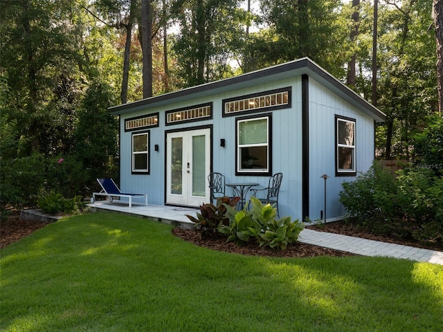 2261 NW 24th Ave, Gainesville, FL 32605 - view of outdoor structure featuring french doors