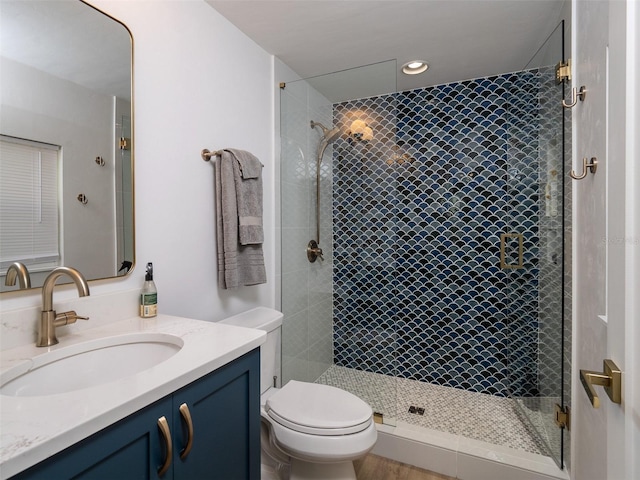 2261 NW 24th Ave, Gainesville, FL 32605 - bathroom with vanity, a shower stall, and recessed lighting