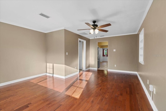 3404 NW 4th St, Gainesville, FL 32609 - spare room with ceiling fan, wood finished floors, and crown molding