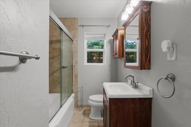 3404 NW 4th St, Gainesville, FL 32609 - full bathroom with vanity, bath / shower combo with glass door, and tile patterned flooring