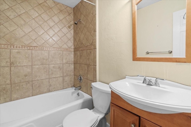 3404 NW 4th St, Gainesville, FL 32609 - full bathroom with vanity, tub / shower combination, and a textured wall