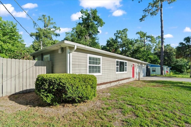 3404 NW 4th St, Gainesville, FL 32609 - view of front of home with an attached garage and concrete driveway