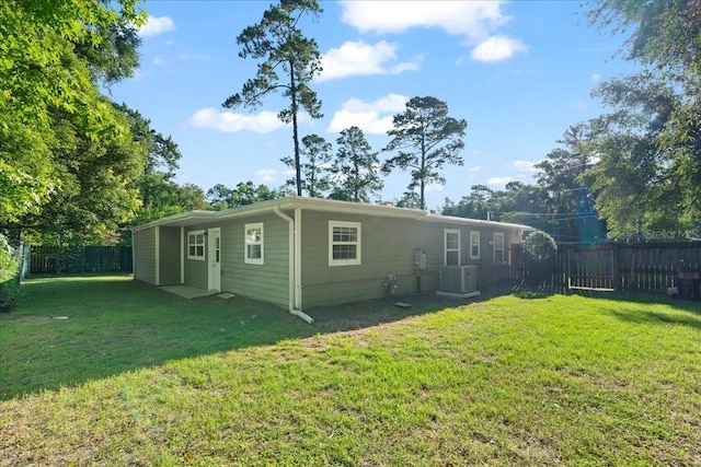 3404 NW 4th St, Gainesville, FL 32609 - rear view of house with a fenced backyard