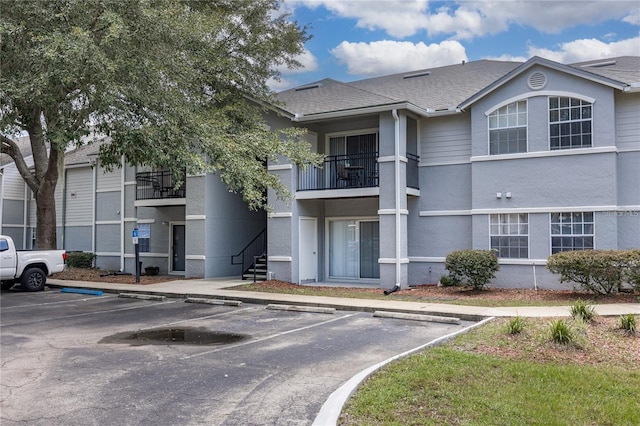 3705 SW 27th St Unit 525, Gainesville, FL 32608 - view of building exterior with uncovered parking