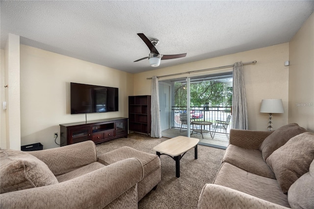 3705 SW 27th St Unit 525, Gainesville, FL 32608 - carpeted living area featuring a textured ceiling and ceiling fan