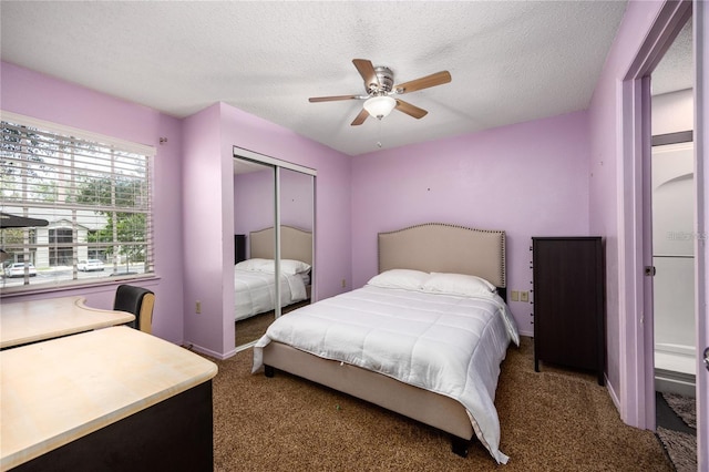 3705 SW 27th St Unit 525, Gainesville, FL 32608 - carpeted bedroom with a closet, a textured ceiling, and a ceiling fan