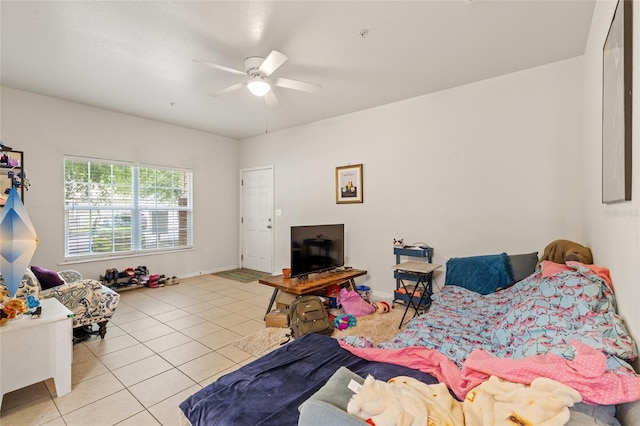 1573 NW 29th Rd Unit 3, Gainesville, FL 32605 - living room with ceiling fan and tile patterned flooring