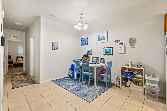 1573 NW 29th Rd Unit 3, Gainesville, FL 32605 - dining room featuring tile patterned flooring and a chandelier