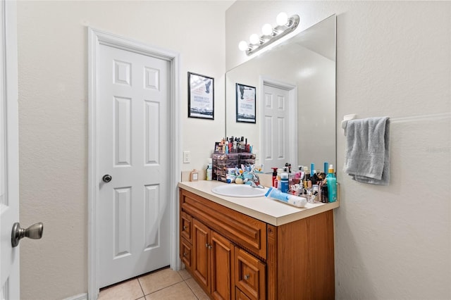1573 NW 29th Rd Unit 3, Gainesville, FL 32605 - bathroom with vanity and tile patterned flooring