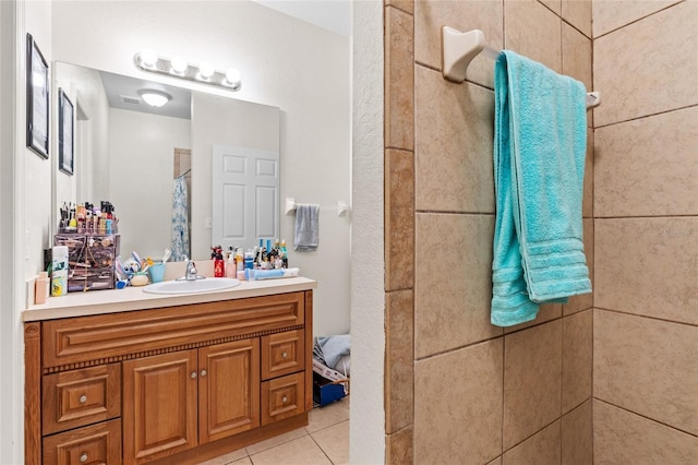 1573 NW 29th Rd Unit 3, Gainesville, FL 32605 - full bath with vanity, a tile shower, and tile patterned floors