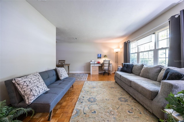 5022 NW 34th Ter, Gainesville, FL 32605 - living room featuring an office area and baseboards